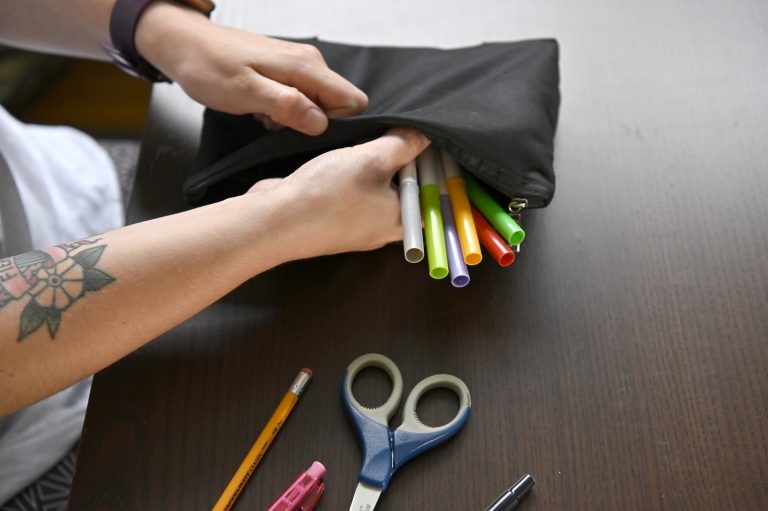 A person builds a pencil case to donate to United Way of the Alberta Capital Region though their Volunteer At Home campaign.