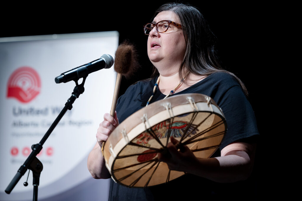 Pamela Spurvey performs traditional Cree water song with a drum