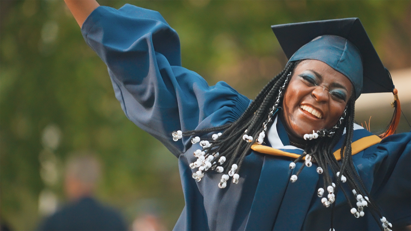 Xiarh, an All in for Youth student, celebrates graduating from Eastglen High School in May 2023.