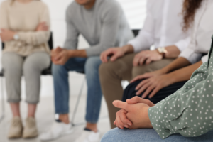 People at group mental health therapy session Adobe Stock