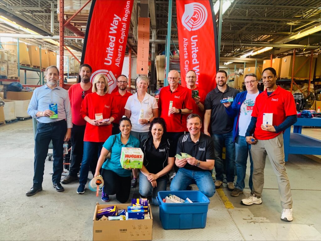 Volunteers for United Way of the Alberta Capital Region sort supplies for hygiene kits, in support of Edmonton and area front-line agencies.