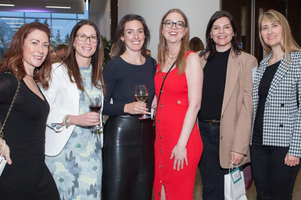 Group of six women pose for a photo at Women United’s event, MindFULL: A Candid Conversation on Women’s Mental Health