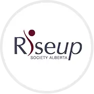 Riseup Society Alberta logo featuring the organization's name in bold, uppercase letters, accompanied by a stylized design symbolizing hope, empowerment, and community support.